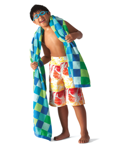 boy with swimming towel