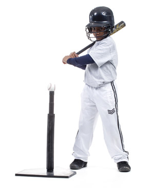 boy ready to swing at a tball